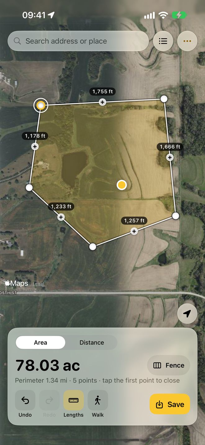 Corners tapped on a satellite map, with each side's length and the area so far.